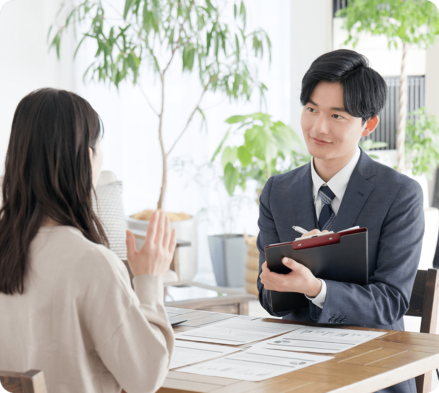 Two people having a business meeting indoors.